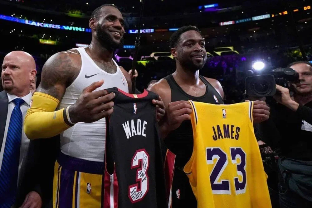 LeBron James swaps jerseys with Dwyane Wade.